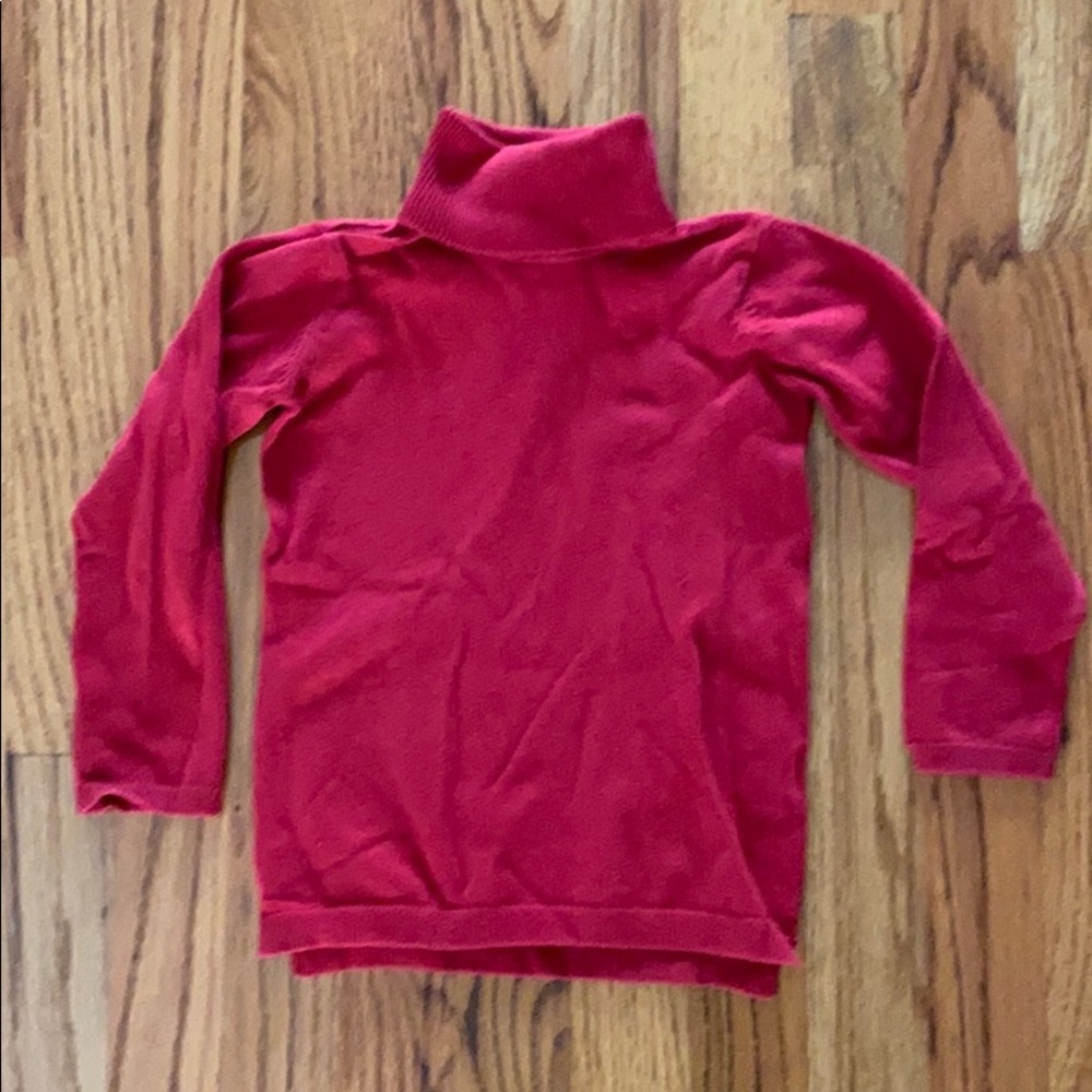 Red turtleneck sweater